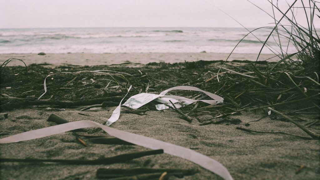 Plastic balloon litter on a beach