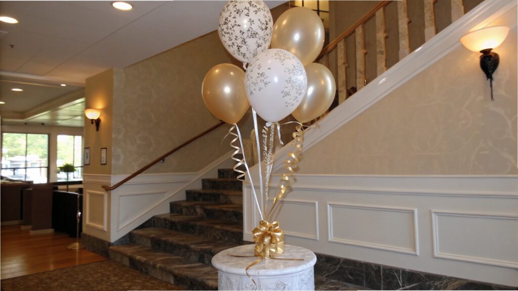 A beautifully arranged [latex balloon bouquet](https://aihuaballoon.com/what-are-latex-balloons-commonly-used-for-at-events/)[^2] on a decorative weight