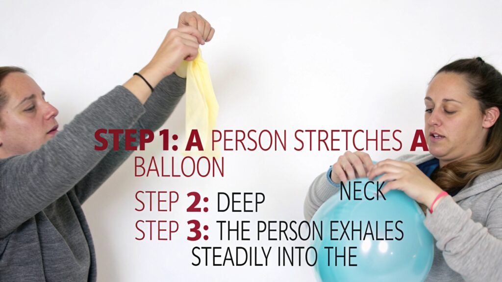 Someone demonstrating balloon inflation techniques