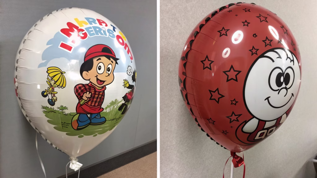 A custom printed Mylar balloon with a photo and a latex balloon with a simple logo