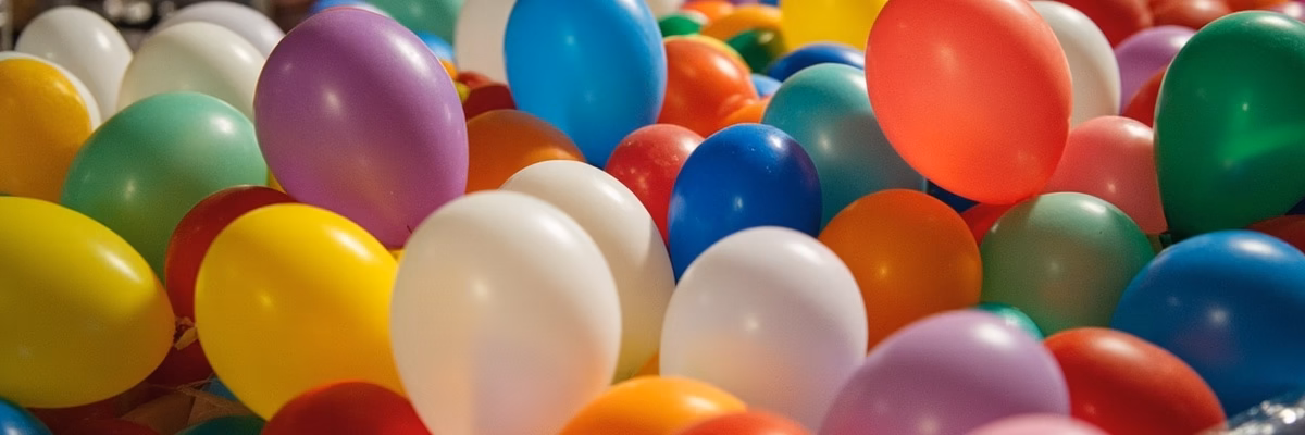 Small 5-inch latex balloons create natural gaps for organic balloon arch texture