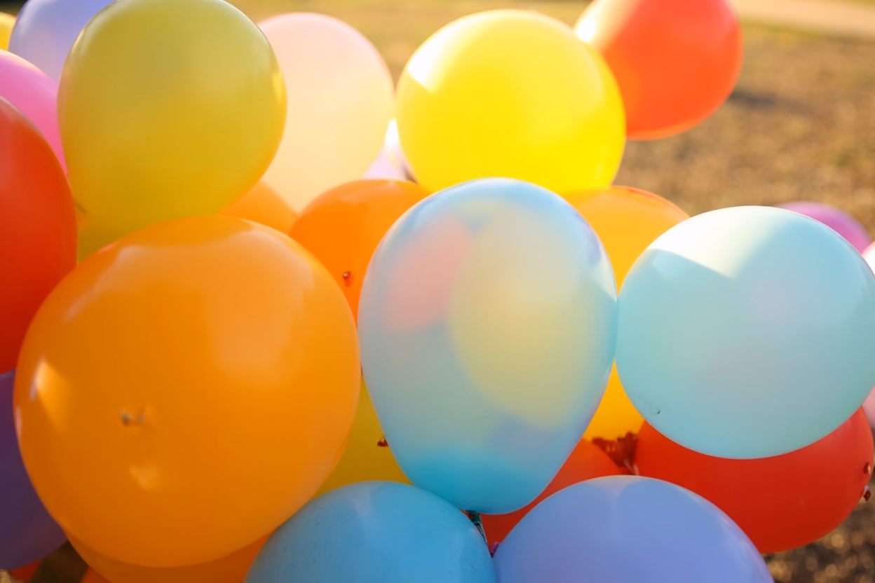 Latex balloons in outdoor setting Latex balloons outdoors showing factors affecting deflation rate