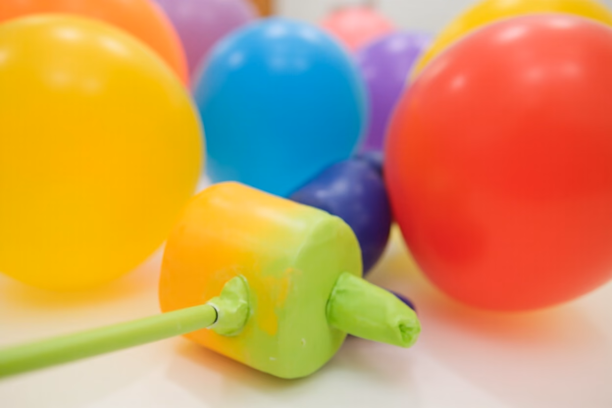 Colorful balloon striker mallet tool for party games