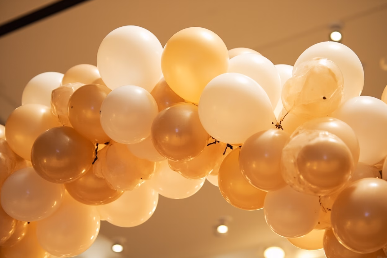 Pearlized balloon arrangement for premium event Pearlized balloons in elegant event decoration arrangement
