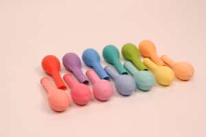 Uninflated macaron latex balloons in assorted colors